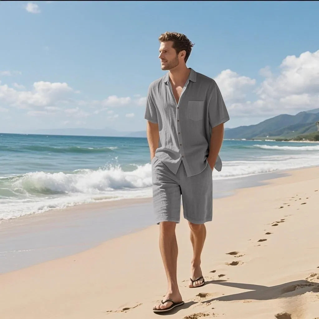Linen blend casual short sleeve shirt and matching shorts set laid flat, shown in light blue colour.