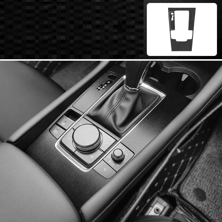 Unksera car interior decorative film sticker kit showing dashboard and centre console application with carbon fibre finish