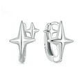 Minimalist star sterling silver ear clips with oxidised finish and XINGX element styling