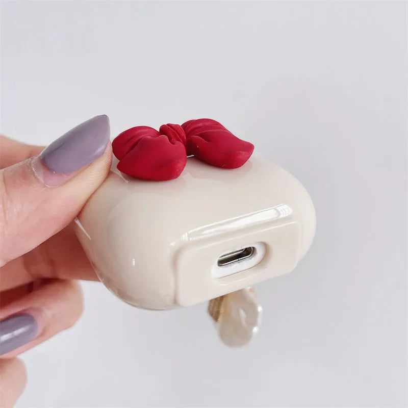 Beige red bow shell wireless earphone case for AirPods with clamshell design
