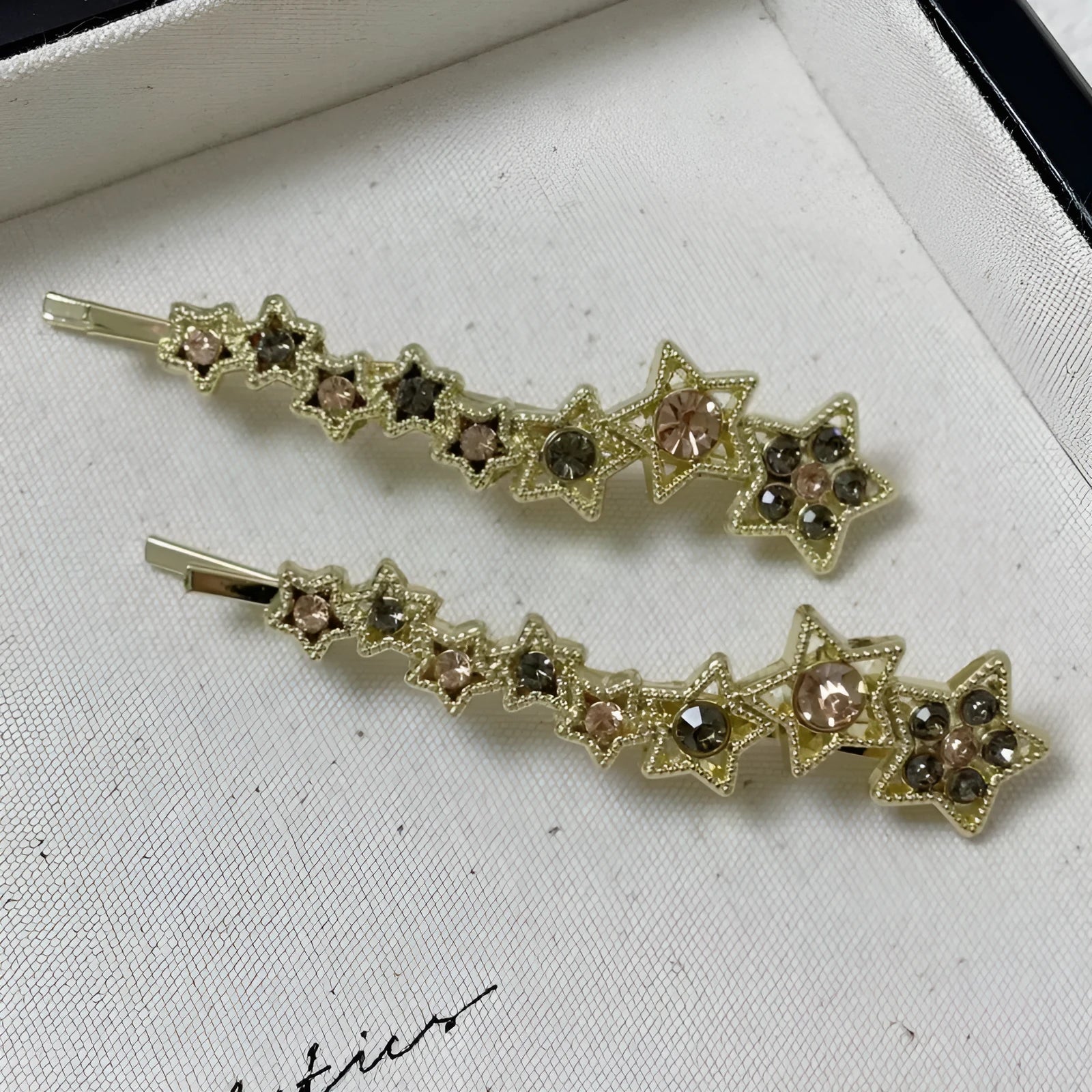 Gold rhinestone barrette with star charms for bangs and broken hairstyles