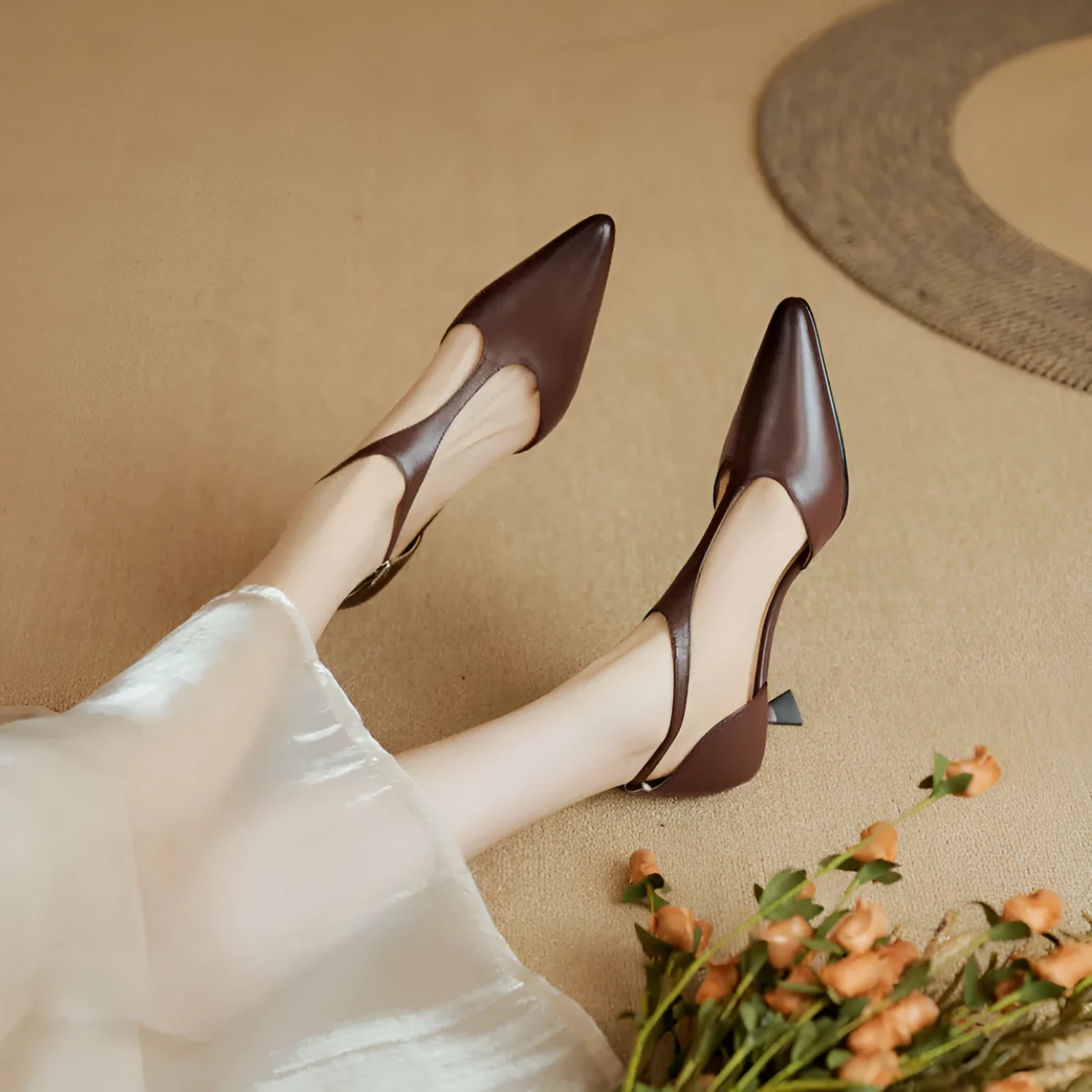 Women's vintage style high heels in cowhide leather with pointed toe design available in black or brown