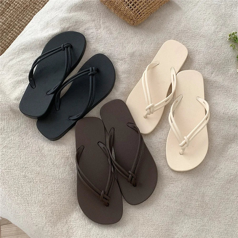 Men's PVC flip flops with toe covering design in various colours on white background