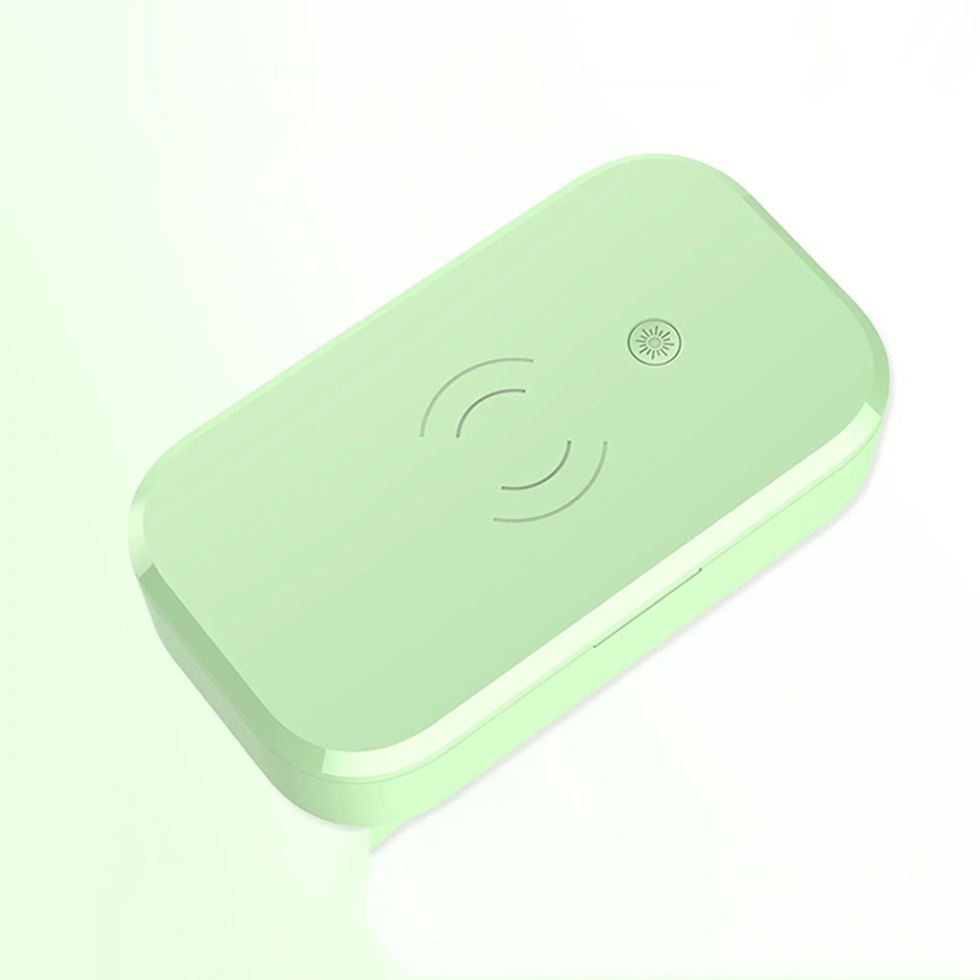 White ultraviolet disinfection box with wireless charging for mobile phones and beauty tools.