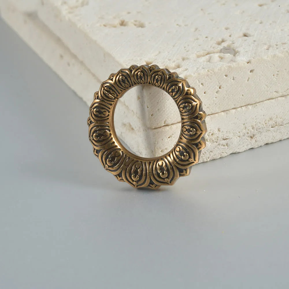 Retro heart-shaped and lotus-shaped magnetic earrings in antique silver and gold finishes