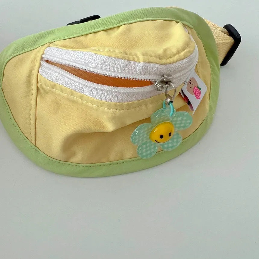 Backpack-style pet carrier for cats and dogs in powder blue, yellow, or green colours with adjustable sizing