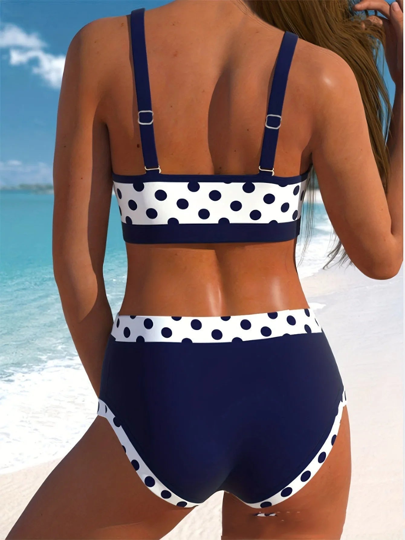 Women's multicolour dot patterned bikini set with conservative boxer briefs bottom.