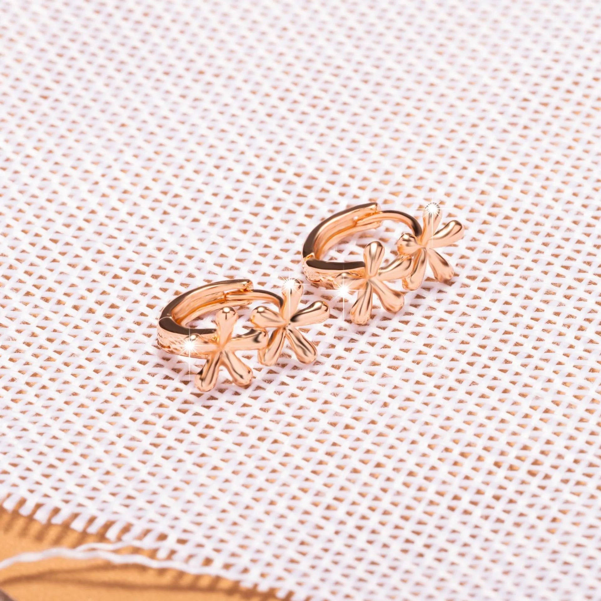 Rose gold electroplated waterdrop flower earrings with circular geometric shape