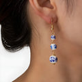Long blue and white porcelain ceramic bead earrings with alloy frame in a retro Chinese style.