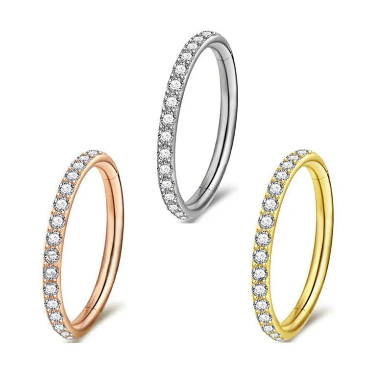 A seamless stainless steel nose ring hoop showing gold and rose gold electroplated colour options.