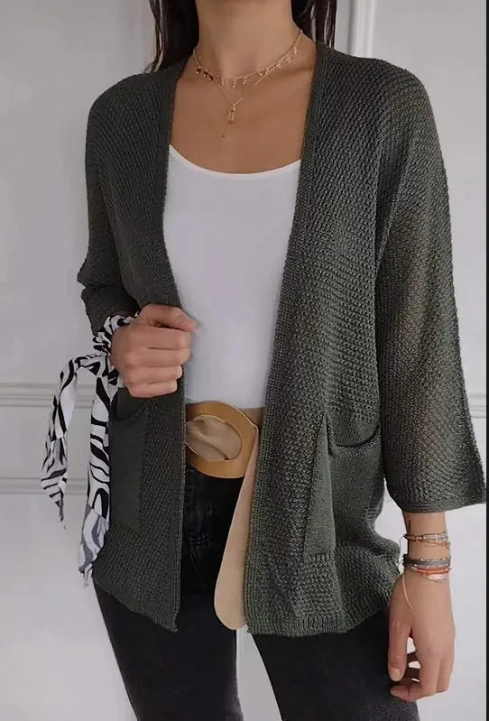 Women's waffle texture cardigan coat in army green with nine-quarter sleeves and pockets.