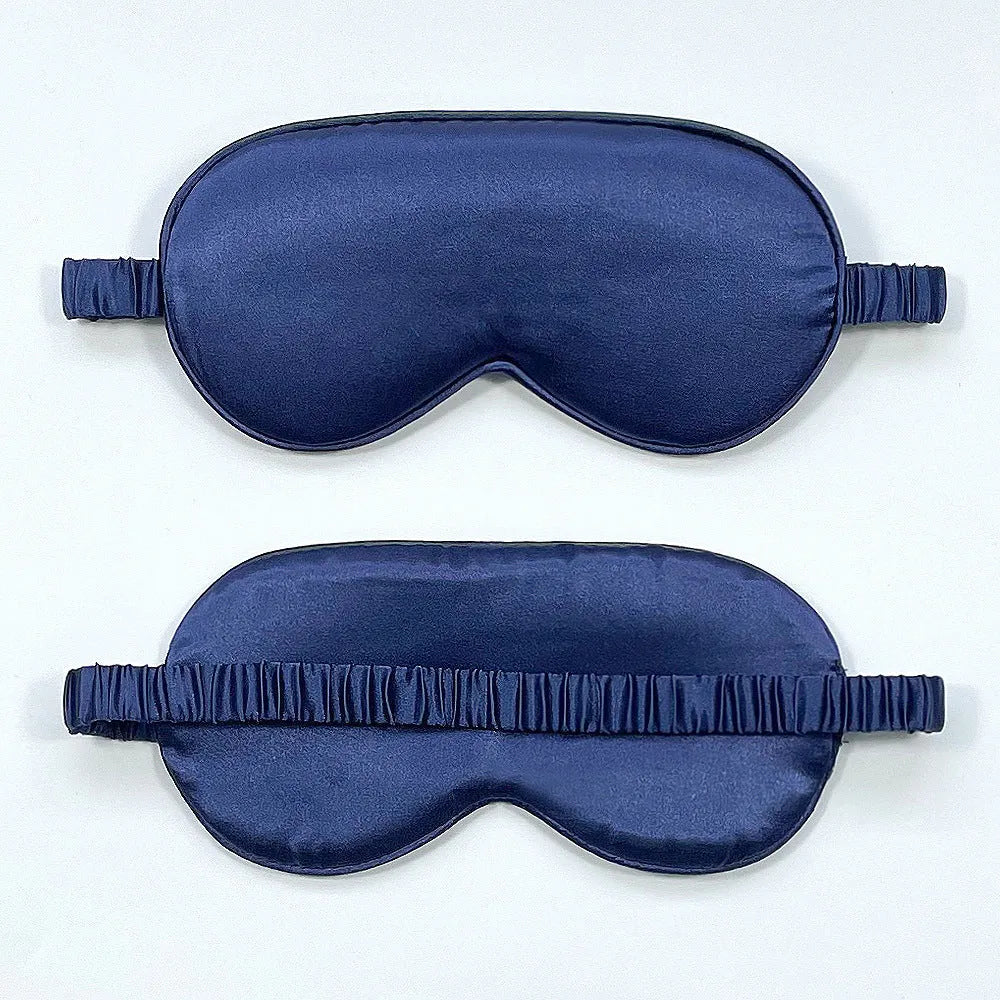 Double-sided Rayon elastic satin sleep mask shown in multiple colour options including sky blue, black, wine red, and light pink.