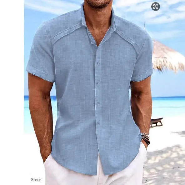 Men's solid colour short sleeve casual shirt in cotton blend fabric on a hanger.