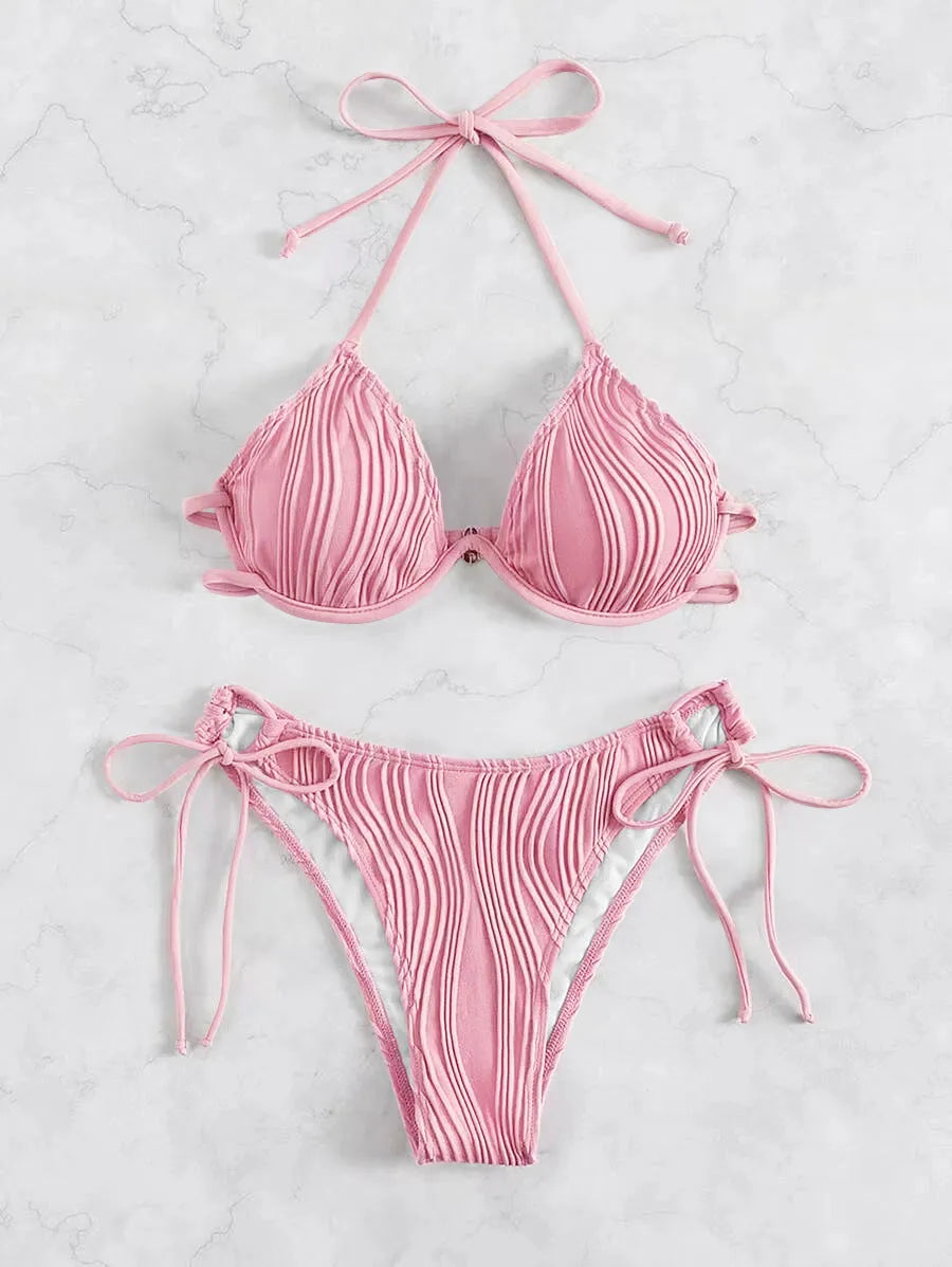 Women's apricot coloured split bikini swimsuit with steel wire bracket support.