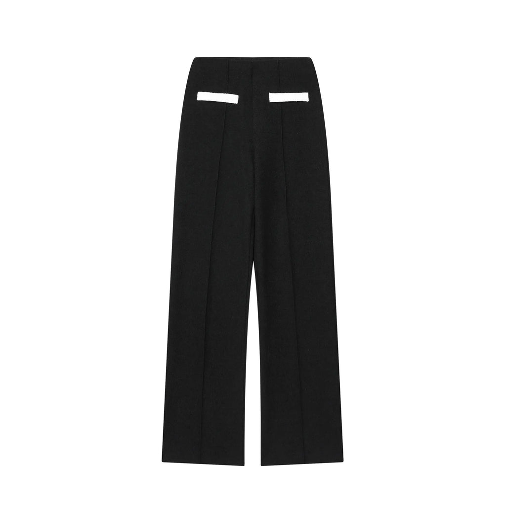 Women's beaded leather round neck top and high-waisted trousers suit in a casual street style.