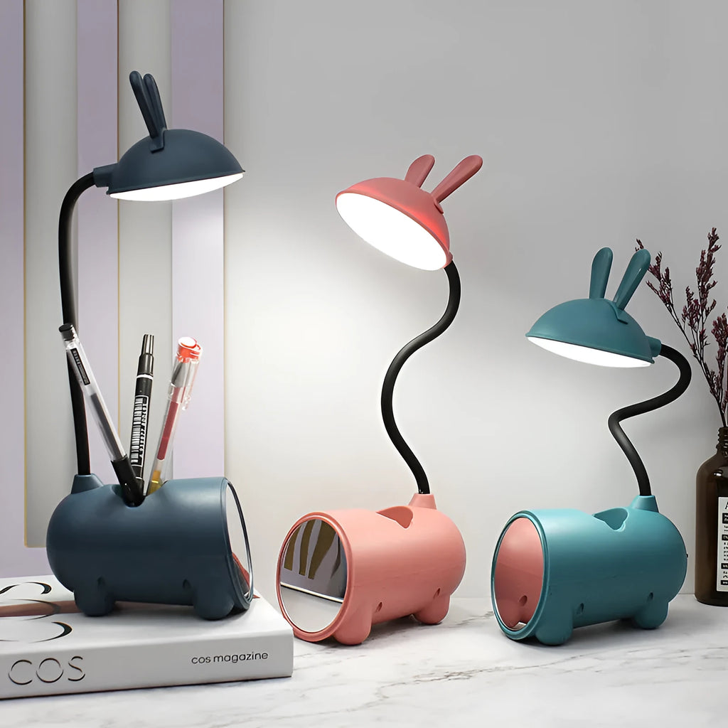 Green cartoon desk lamp with USB cable and pen storage compartment