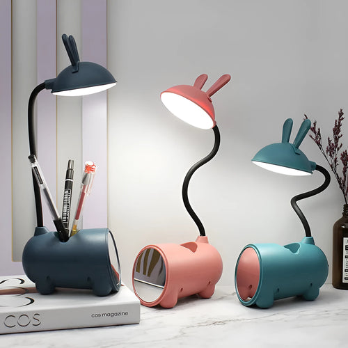 Green cartoon desk lamp with USB cable and pen storage compartment