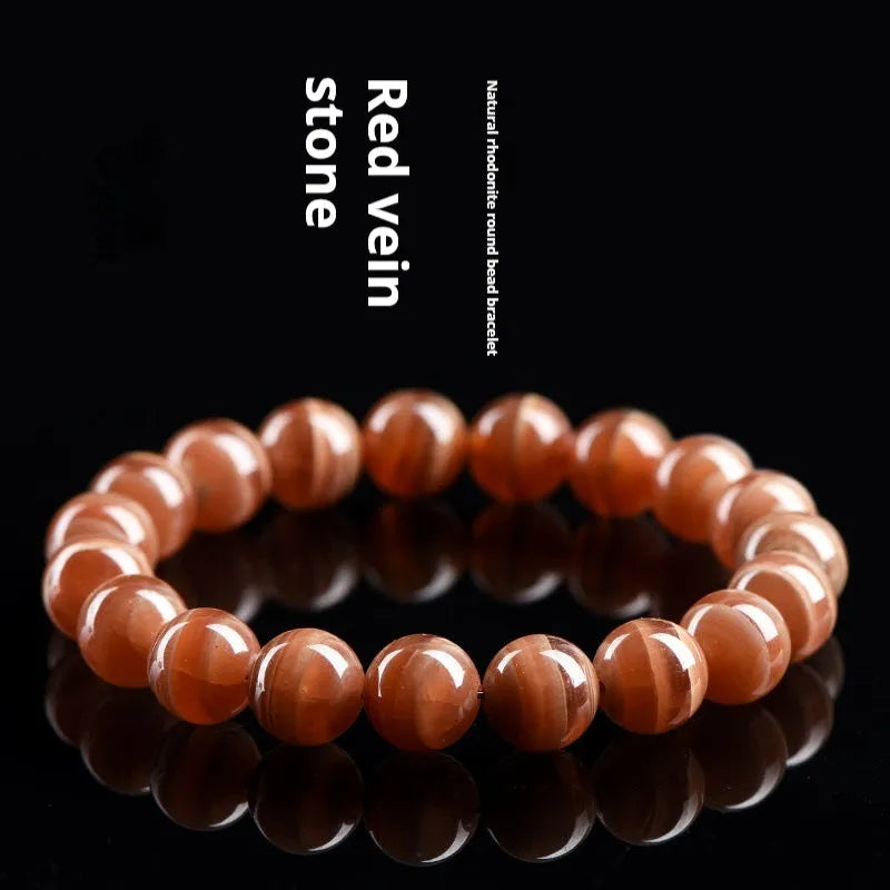 Natural rhodochrosite round bead bracelet from Peru in 6mm or 8mm size
