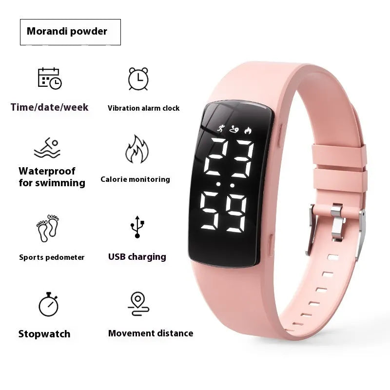 Black vibration alarm smart watch with LED display and silicone strap on a wrist.