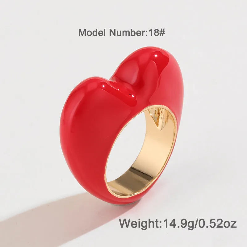 Original design three-dimensional enamel heart ring in zinc alloy showing colour options