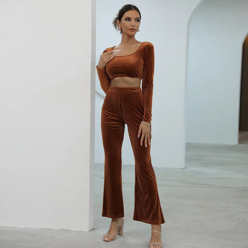 Caramel coloured women's long sleeve sweater and matching trousers casual two-piece set.