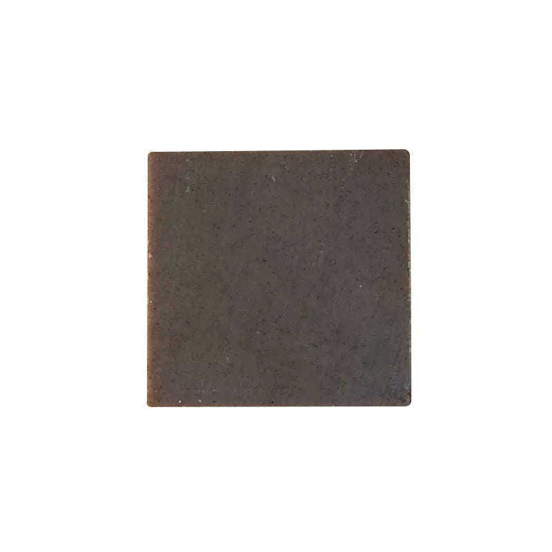 A single 72g bar of nine grass cold process shampoo soap, silicone oil-free.