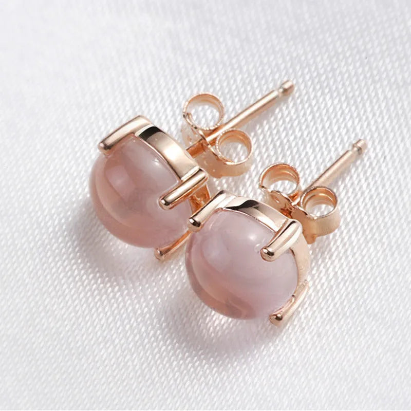 Rose gold Korean style stud earrings with synthetic Ross quartz and crystal inlay in drop shape