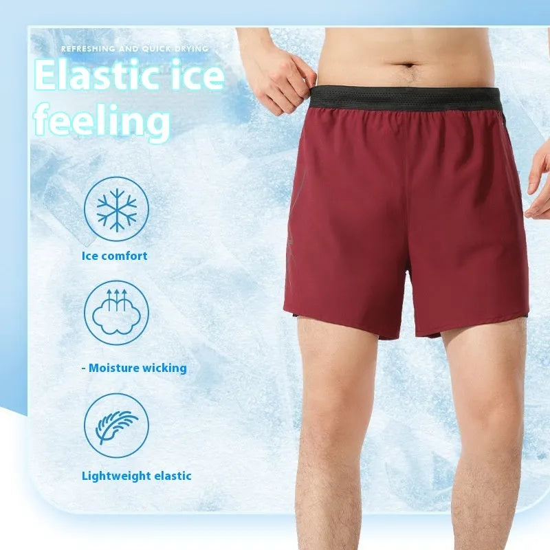 Men's low-waist polyester basketball shorts in a solid colour on a size chart background.