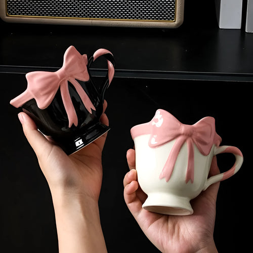 Ceramic heart bow mug with 301-400ml capacity in black pink or white powder colour