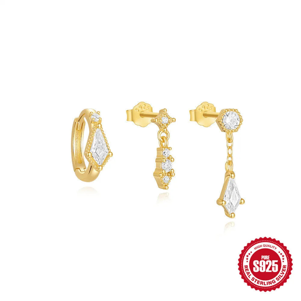 Set of three S925 sterling silver geometric tassel ear studs with zircon details on a plain background.