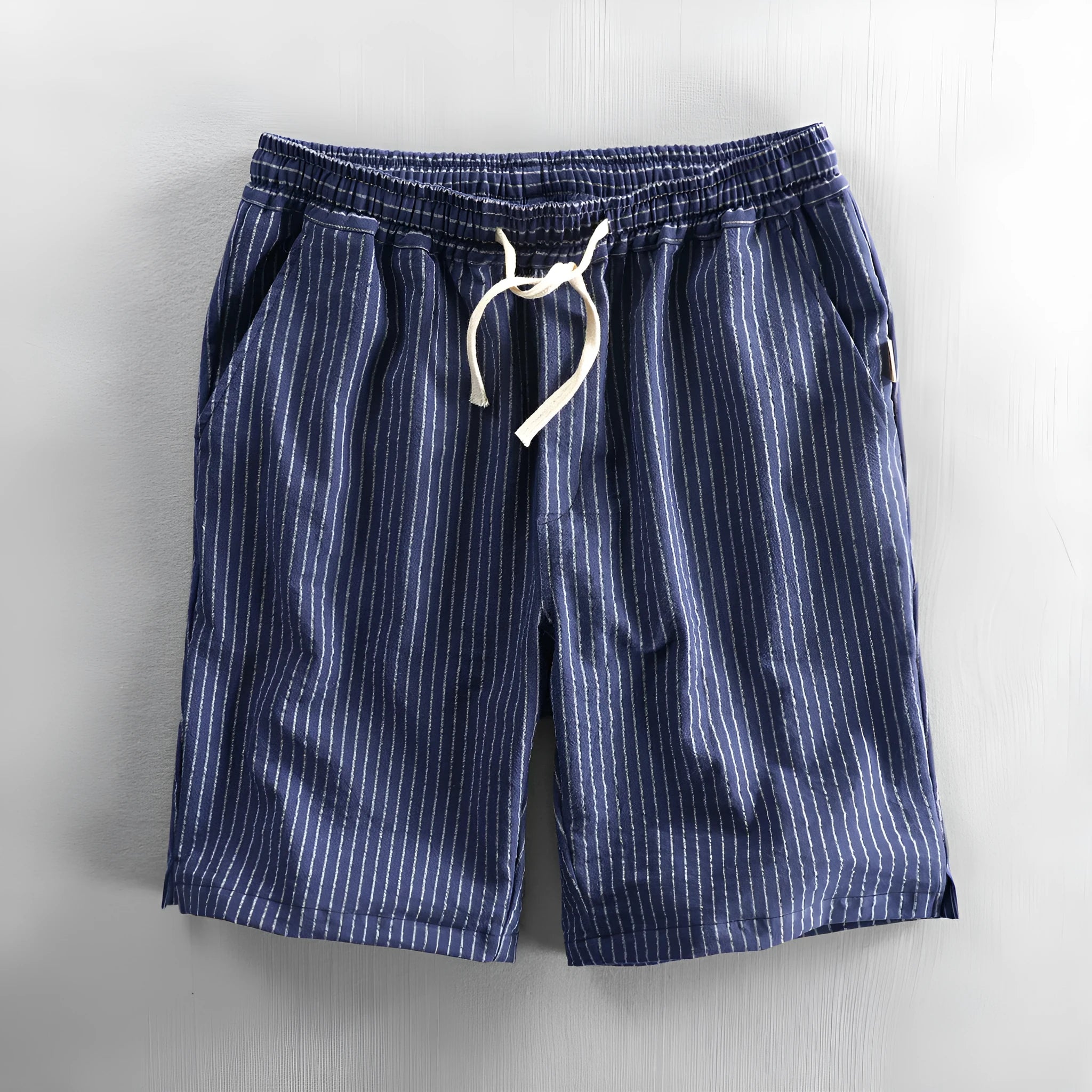 Men's striped casual shorts in loose straight-leg fit with elastic waistband.