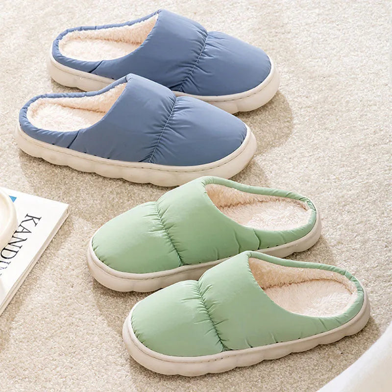 Down cotton indoor slippers with artificial leather upper and rubber sole in various colours