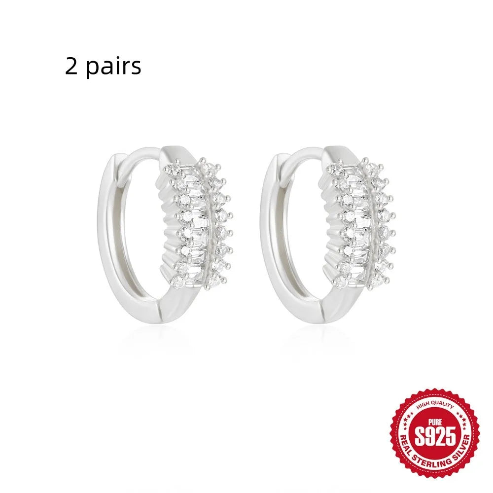 Sterling silver geometric stud earrings with small round diamond accent in gold or silver finish