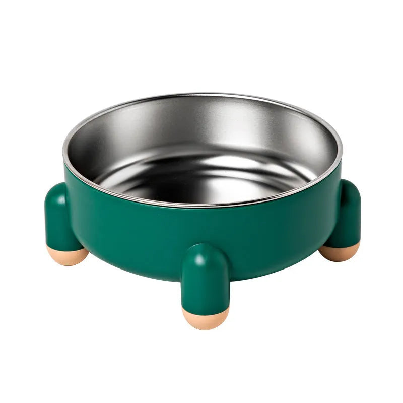 Green stainless steel pet bowl with non-slip base and high foot on a kitchen floor