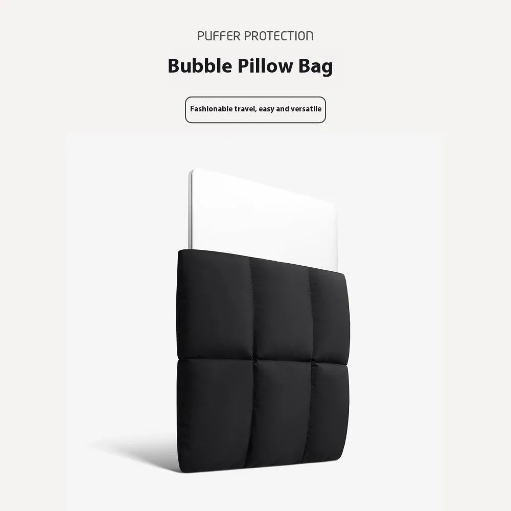Soft black polyester laptop sleeve for a 15.6-inch device with sewing thread detail.