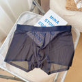 Men's seamless quick-drying nylon boxer shorts in light brown colour showing mid waist and body shaping fit.