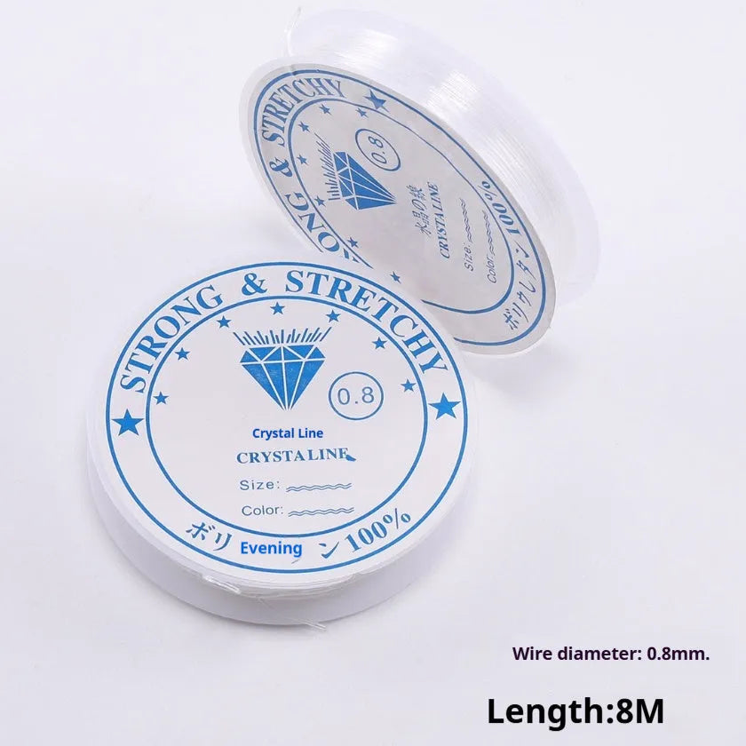 Reel of transparent white elastic fishing line for DIY crafts and jewellery.