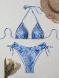 Women's denim blue printed bikini set with strap design showing front and back views