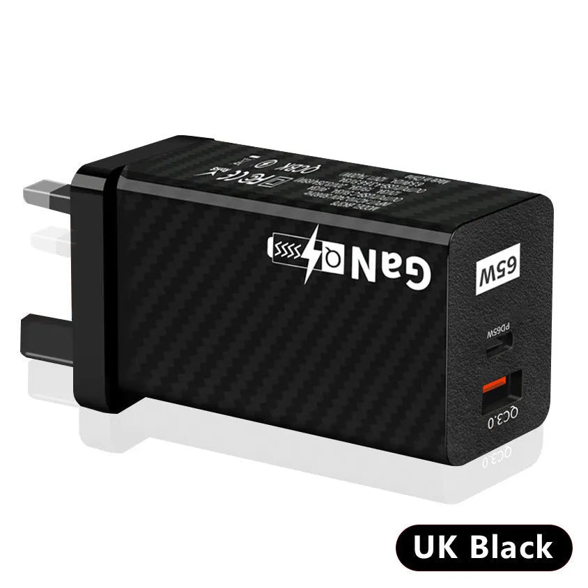 White Gallium Nitride 65W laptop charger with EU UK US plugs showing compact size