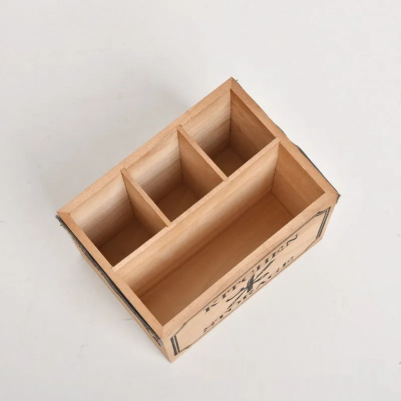 Solid wooden kitchen storage box with internal grid divider for knives, forks, and chopsticks.
