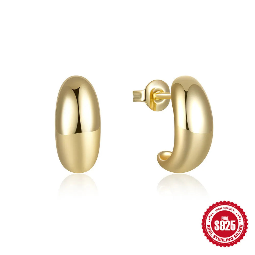 Sterling silver C-shaped stud earrings with electroplated gold finish