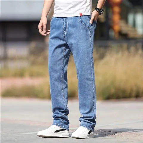 Men's smoky gray straight leg jeans with low waist and zip fly made from elastic rabbit fur fabric