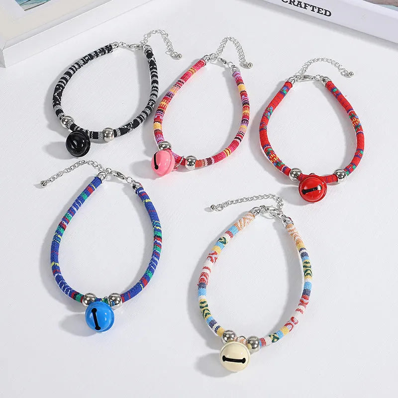 Ethnic pattern pet collar with bell feature for cats and dogs in various colours