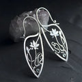 Silver electroplated alloy earrings with lotus vine geometric design and retro styling elements