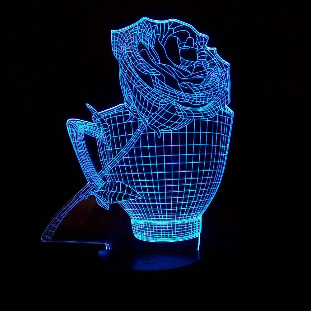 3D rose flower shaped night light glowing with multi-coloured LEDs on a black ABS base.