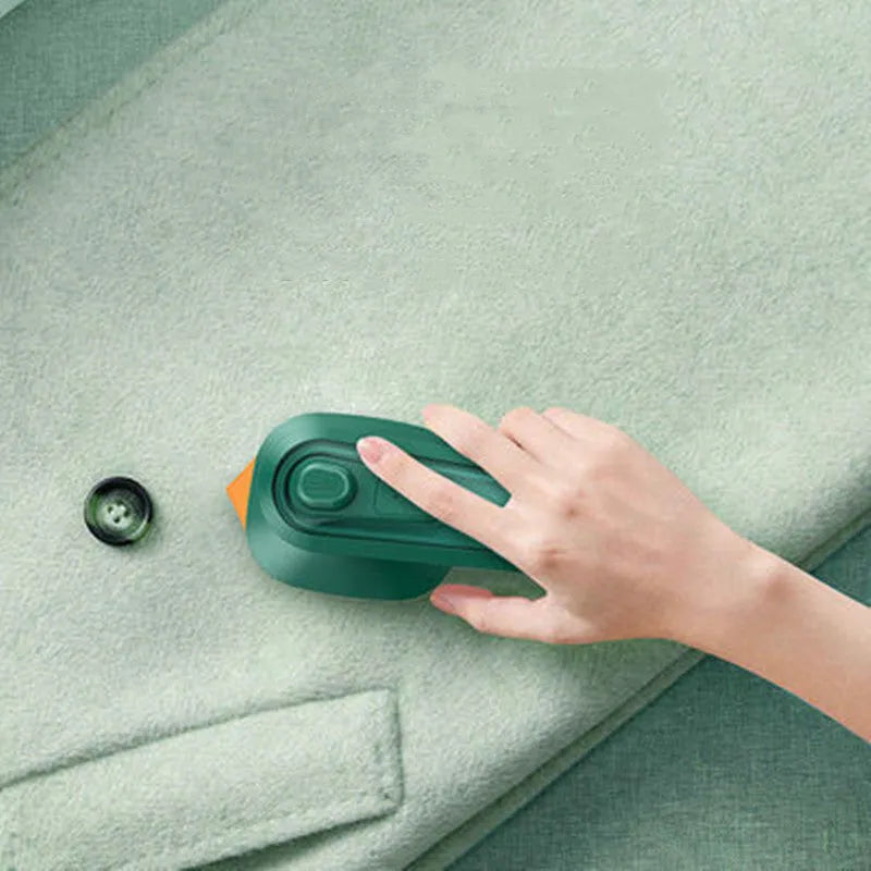 Dark green portable hanging ironing machine with ceramic panel and compact handheld design