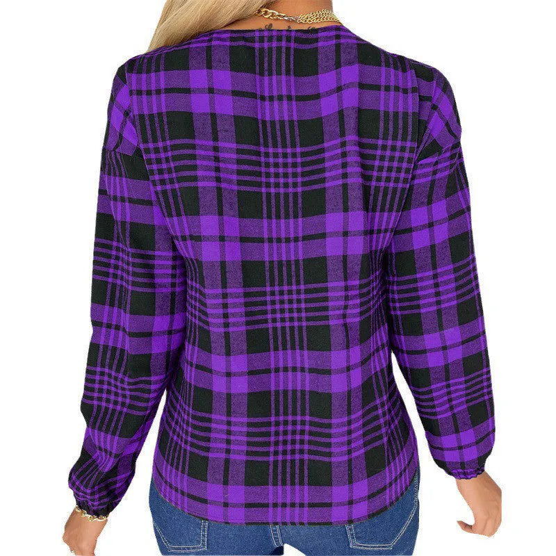 Women's purple plaid polyester shirt with loose casual cut and regular sleeves on hanger