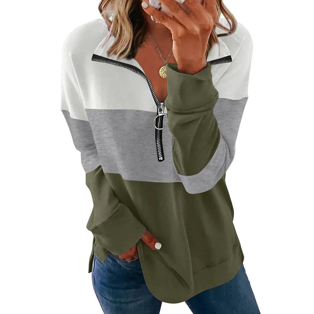 Women's loose long-sleeved leopard print sweater in a green colour variant on a hanger.