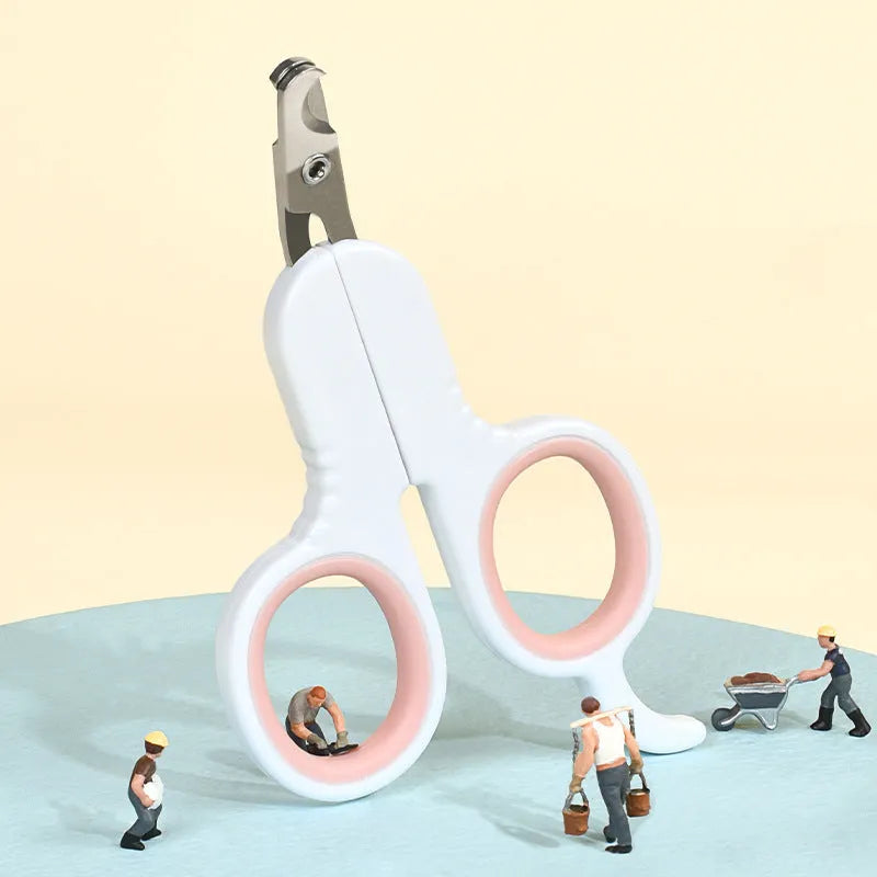 Professional grey pet nail clippers with curved tips and a rubberised ergonomic handle.