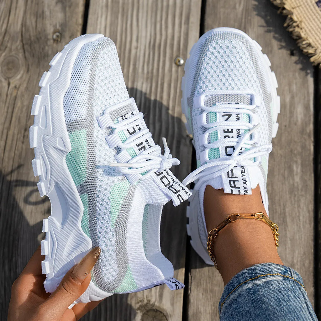 Women's Flyknit mesh lace-up sneakers in multiple colour options with rubber sole